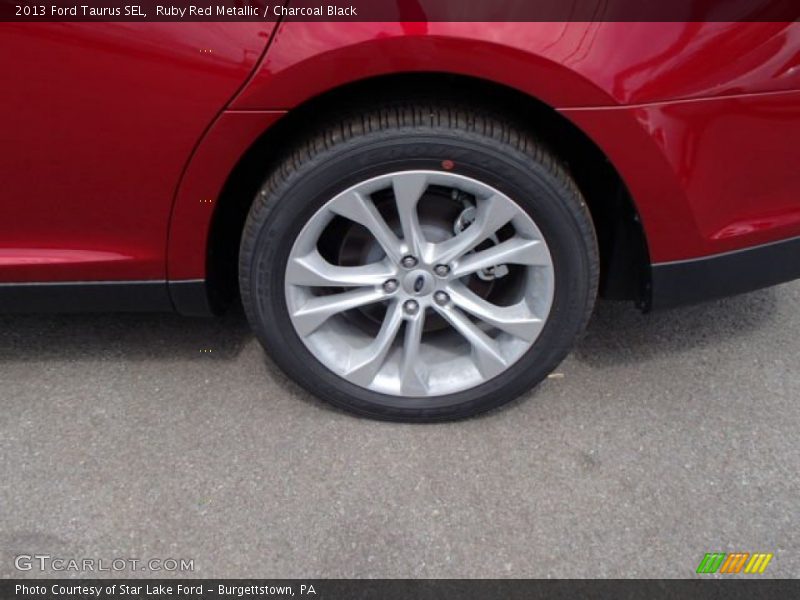 Ruby Red Metallic / Charcoal Black 2013 Ford Taurus SEL