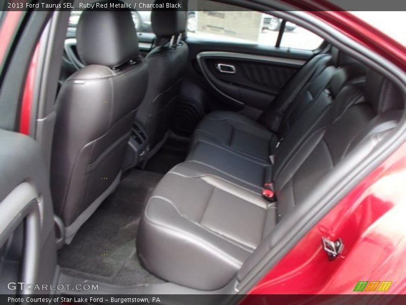 Ruby Red Metallic / Charcoal Black 2013 Ford Taurus SEL