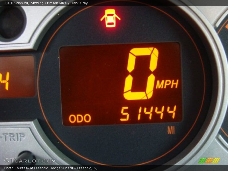 Sizzling Crimson Mica / Dark Gray 2010 Scion xB