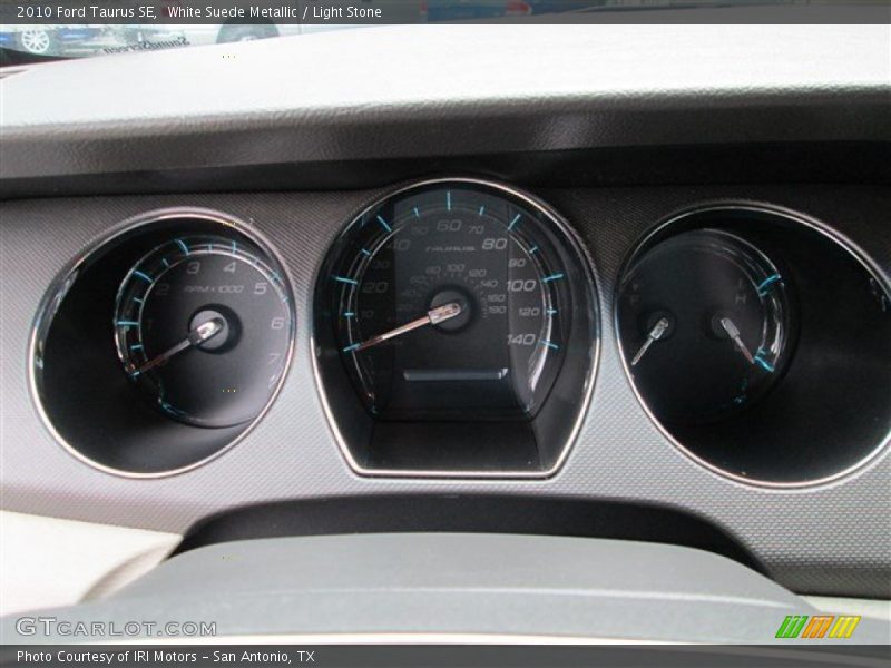 White Suede Metallic / Light Stone 2010 Ford Taurus SE