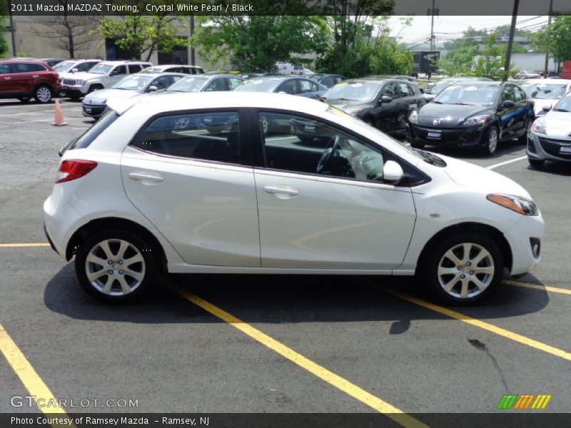 Crystal White Pearl / Black 2011 Mazda MAZDA2 Touring