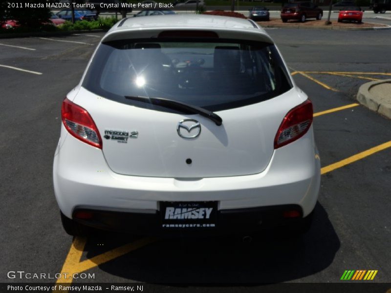 Crystal White Pearl / Black 2011 Mazda MAZDA2 Touring