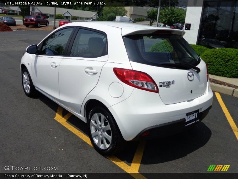 Crystal White Pearl / Black 2011 Mazda MAZDA2 Touring