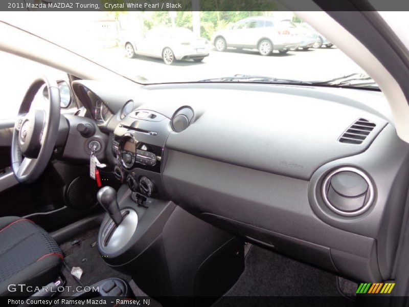 Crystal White Pearl / Black 2011 Mazda MAZDA2 Touring