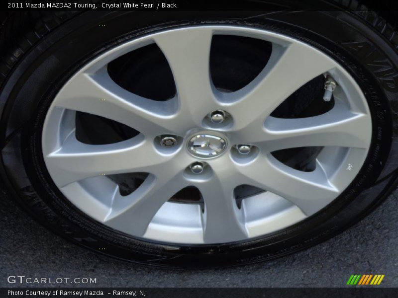 Crystal White Pearl / Black 2011 Mazda MAZDA2 Touring
