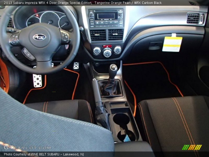 Dashboard of 2013 Impreza WRX 4 Door Orange Special Edition