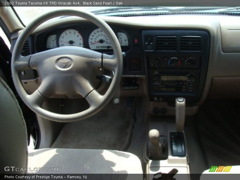 Black Sand Pearl / Oak 2002 Toyota Tacoma V6 TRD Xtracab 4x4