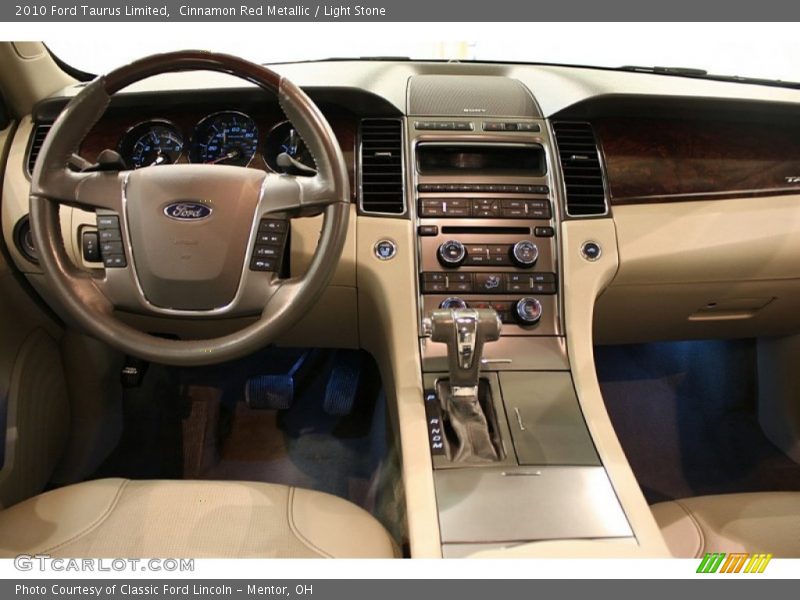 Cinnamon Red Metallic / Light Stone 2010 Ford Taurus Limited