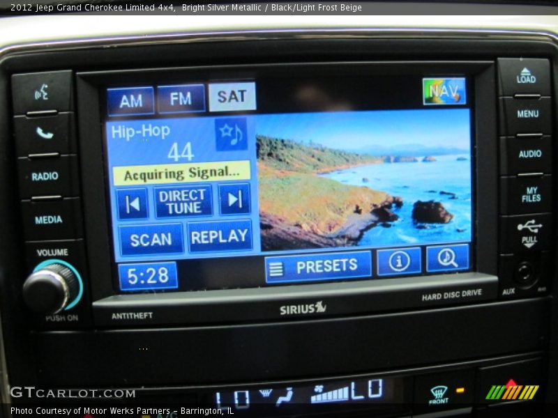 Bright Silver Metallic / Black/Light Frost Beige 2012 Jeep Grand Cherokee Limited 4x4