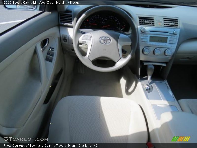 Aloe Green Metallic / Bisque 2010 Toyota Camry LE
