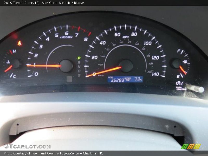 Aloe Green Metallic / Bisque 2010 Toyota Camry LE