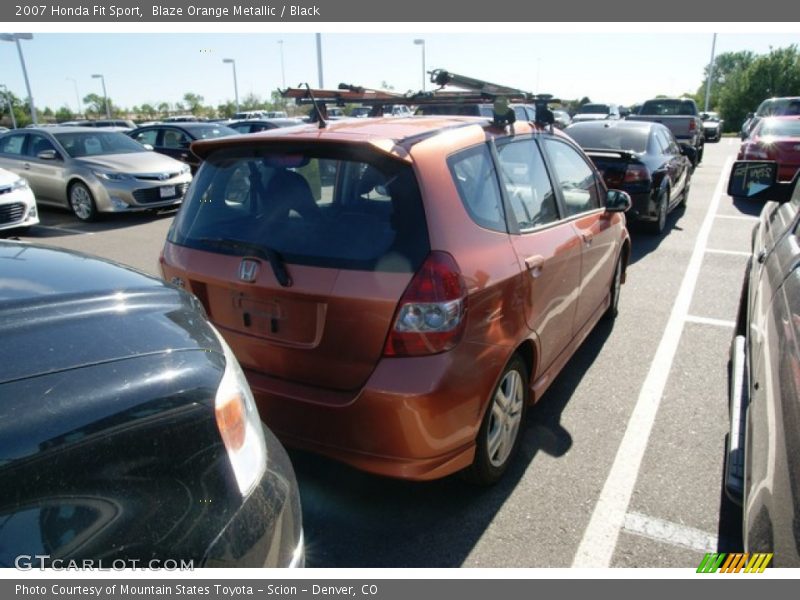 Blaze Orange Metallic / Black 2007 Honda Fit Sport