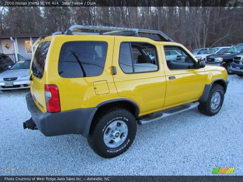 Solar Yellow / Dusk 2000 Nissan Xterra SE V6 4x4