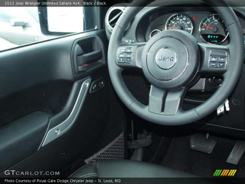Black / Black 2013 Jeep Wrangler Unlimited Sahara 4x4