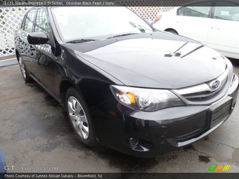 Obsidian Black Pearl / Ivory 2011 Subaru Impreza 2.5i Sedan