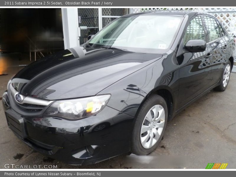 Obsidian Black Pearl / Ivory 2011 Subaru Impreza 2.5i Sedan