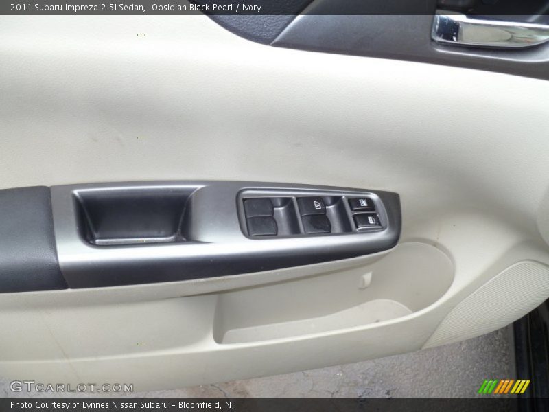 Obsidian Black Pearl / Ivory 2011 Subaru Impreza 2.5i Sedan
