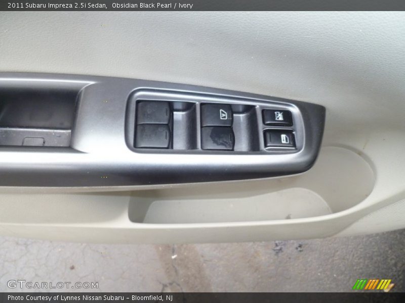 Obsidian Black Pearl / Ivory 2011 Subaru Impreza 2.5i Sedan