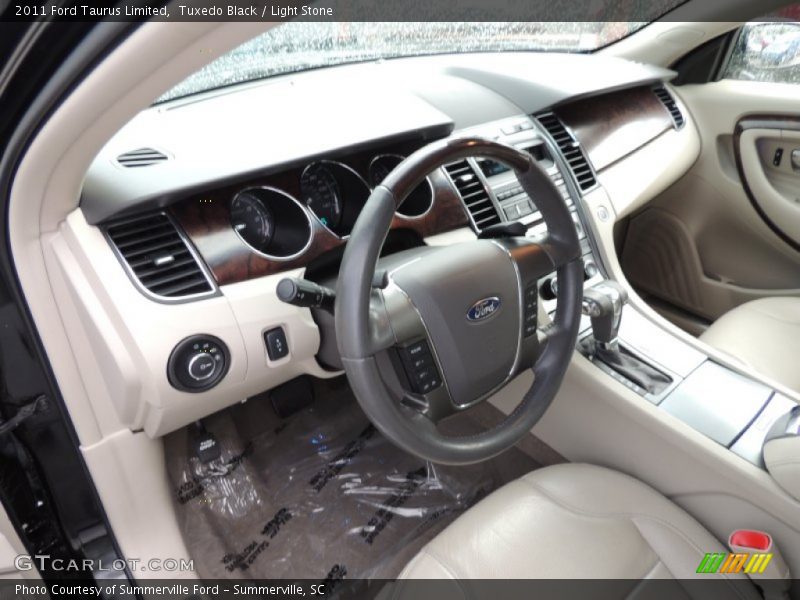 Tuxedo Black / Light Stone 2011 Ford Taurus Limited