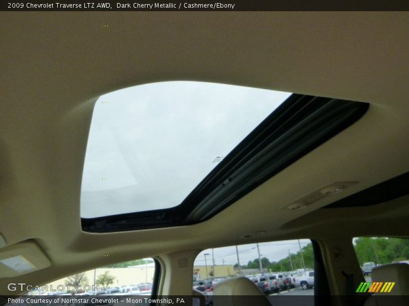 Dark Cherry Metallic / Cashmere/Ebony 2009 Chevrolet Traverse LTZ AWD