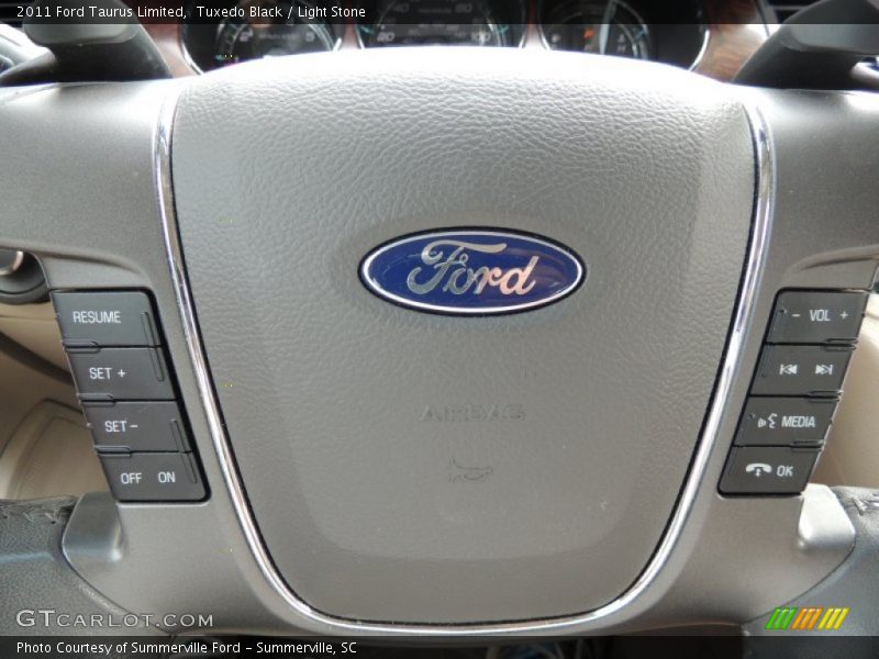 Tuxedo Black / Light Stone 2011 Ford Taurus Limited