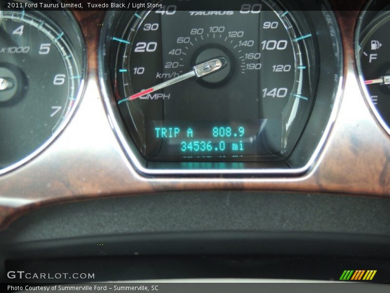 Tuxedo Black / Light Stone 2011 Ford Taurus Limited