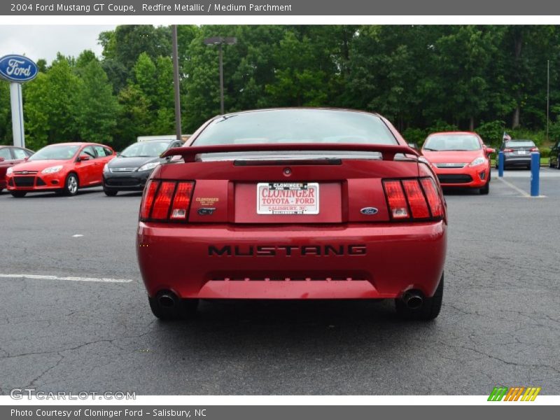 Redfire Metallic / Medium Parchment 2004 Ford Mustang GT Coupe