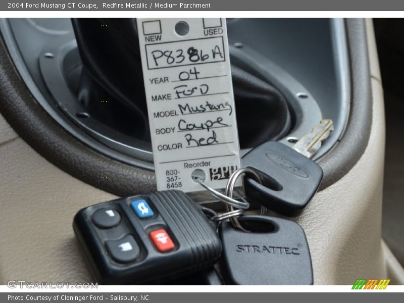 Redfire Metallic / Medium Parchment 2004 Ford Mustang GT Coupe