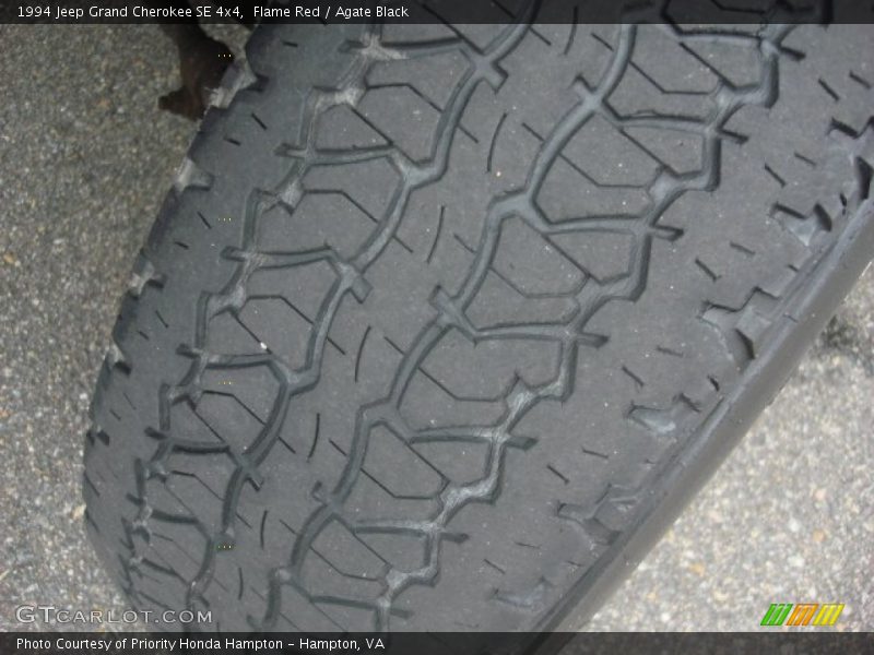 Flame Red / Agate Black 1994 Jeep Grand Cherokee SE 4x4