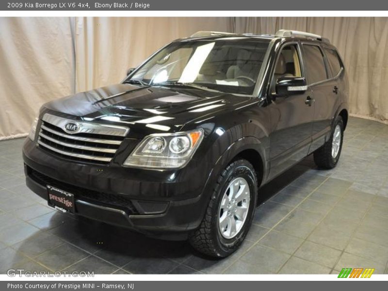 Ebony Black / Beige 2009 Kia Borrego LX V6 4x4