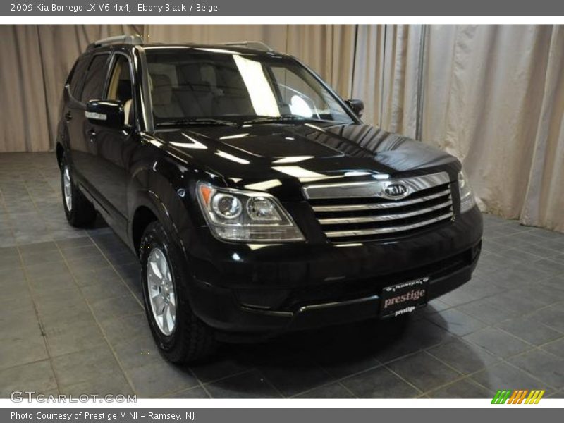 Ebony Black / Beige 2009 Kia Borrego LX V6 4x4
