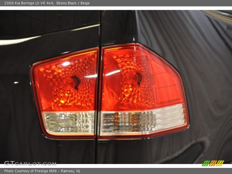 Ebony Black / Beige 2009 Kia Borrego LX V6 4x4