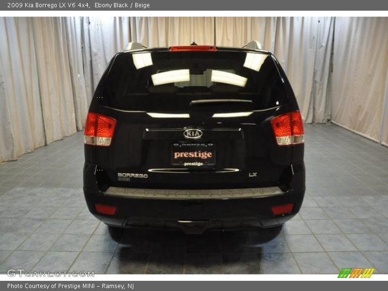 Ebony Black / Beige 2009 Kia Borrego LX V6 4x4