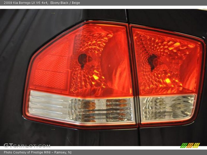 Ebony Black / Beige 2009 Kia Borrego LX V6 4x4