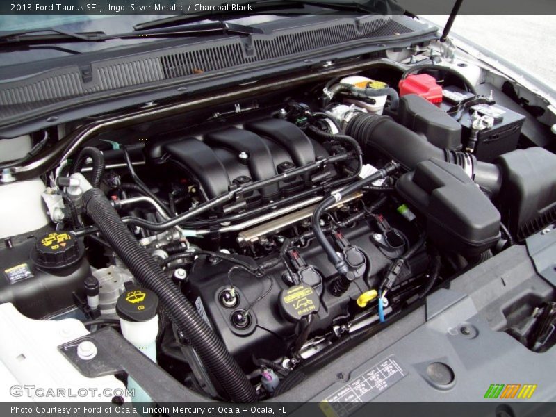 Ingot Silver Metallic / Charcoal Black 2013 Ford Taurus SEL