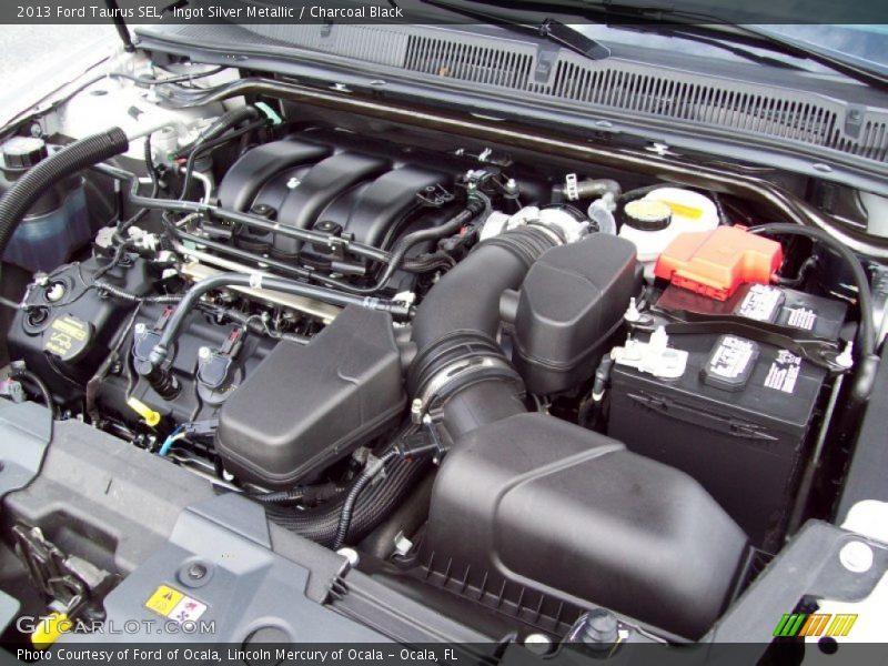 Ingot Silver Metallic / Charcoal Black 2013 Ford Taurus SEL