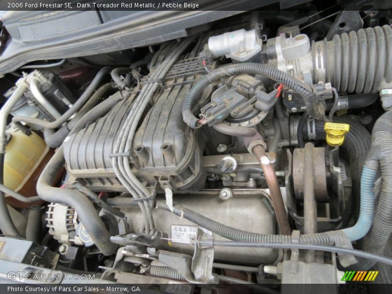 Dark Toreador Red Metallic / Pebble Beige 2006 Ford Freestar SE