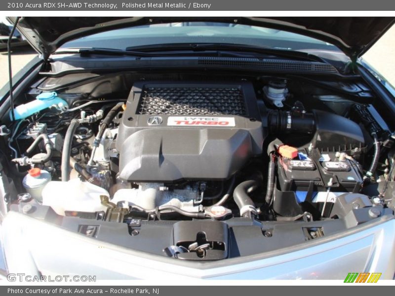 Polished Metal Metallic / Ebony 2010 Acura RDX SH-AWD Technology