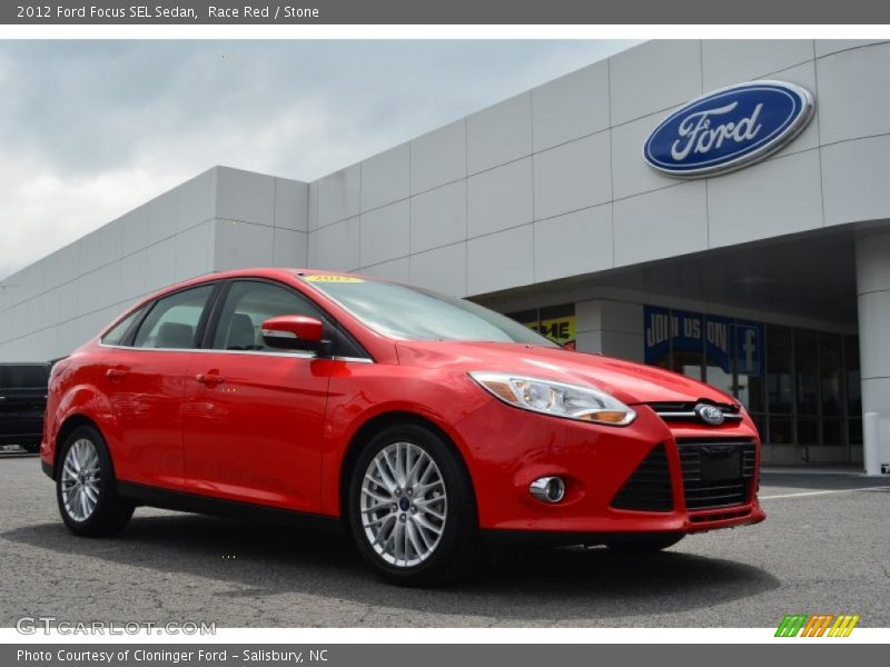 Race Red / Stone 2012 Ford Focus SEL Sedan