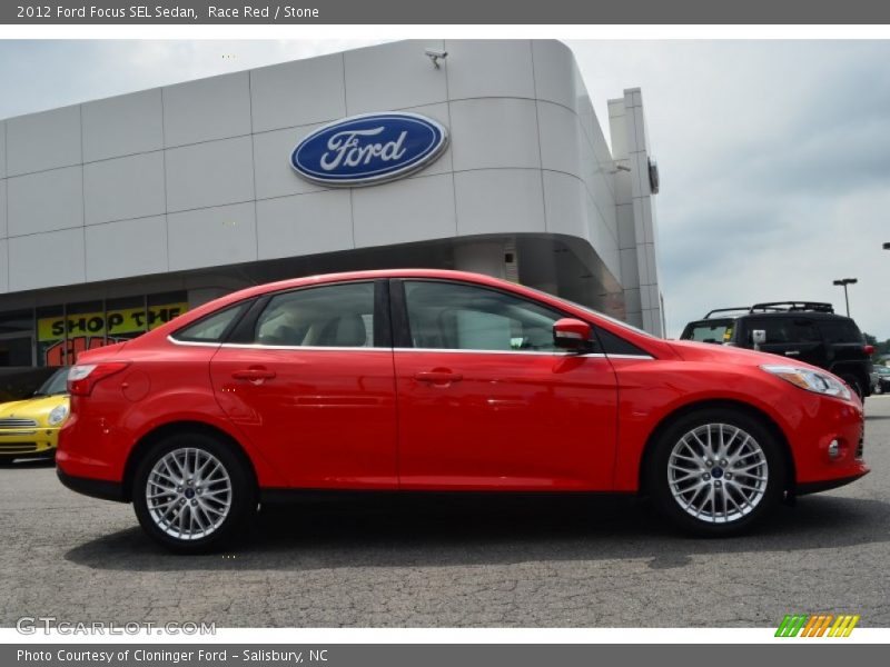 Race Red / Stone 2012 Ford Focus SEL Sedan