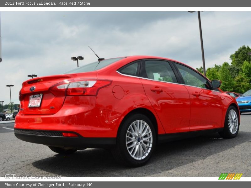 Race Red / Stone 2012 Ford Focus SEL Sedan