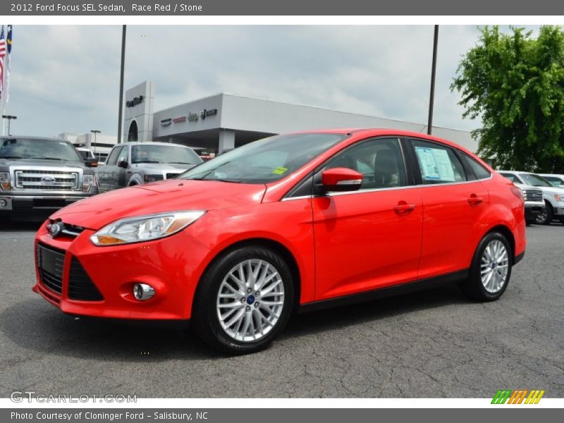 Race Red / Stone 2012 Ford Focus SEL Sedan