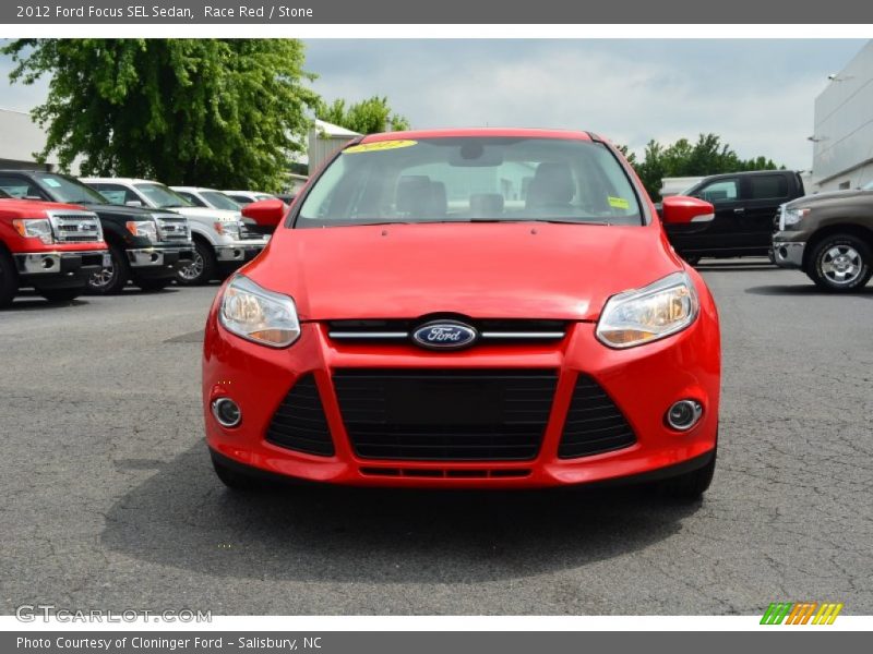Race Red / Stone 2012 Ford Focus SEL Sedan