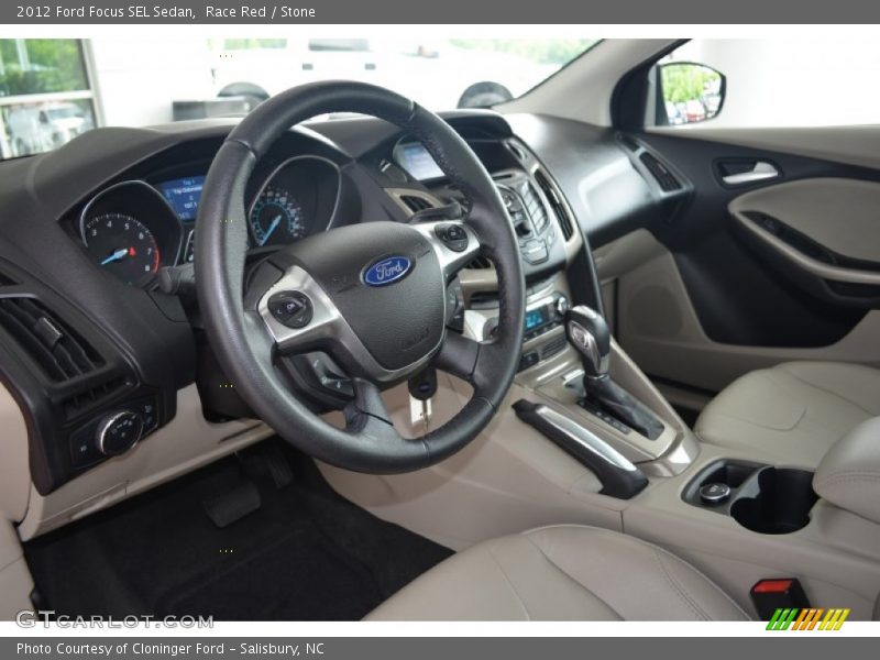 Race Red / Stone 2012 Ford Focus SEL Sedan