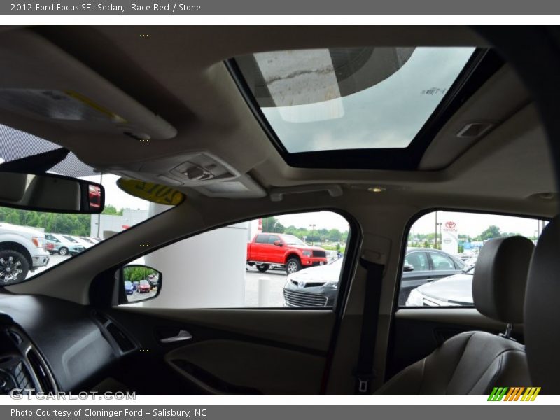 Race Red / Stone 2012 Ford Focus SEL Sedan
