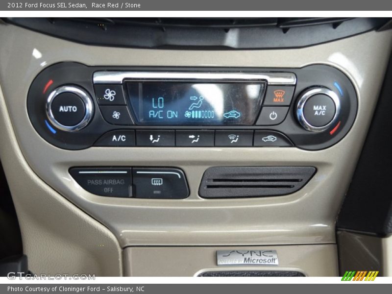 Race Red / Stone 2012 Ford Focus SEL Sedan