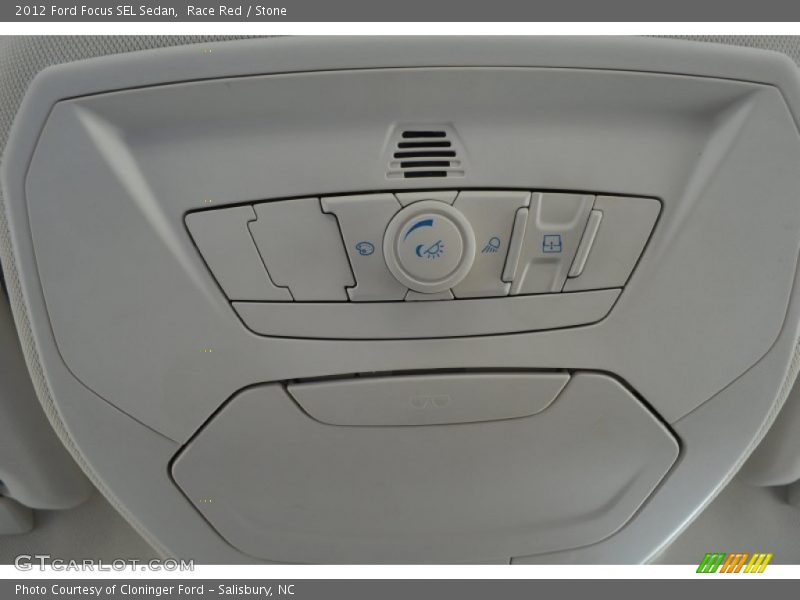 Race Red / Stone 2012 Ford Focus SEL Sedan