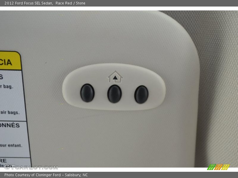 Race Red / Stone 2012 Ford Focus SEL Sedan