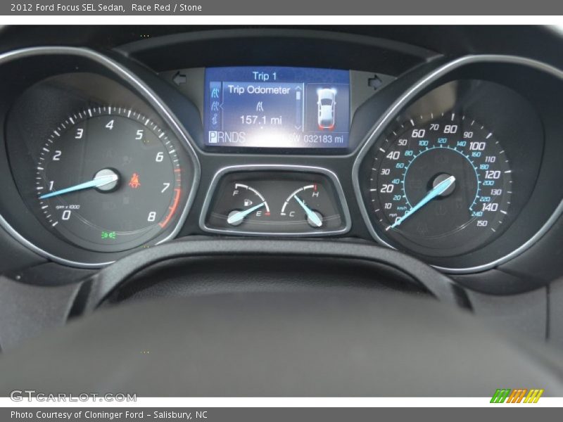 Race Red / Stone 2012 Ford Focus SEL Sedan