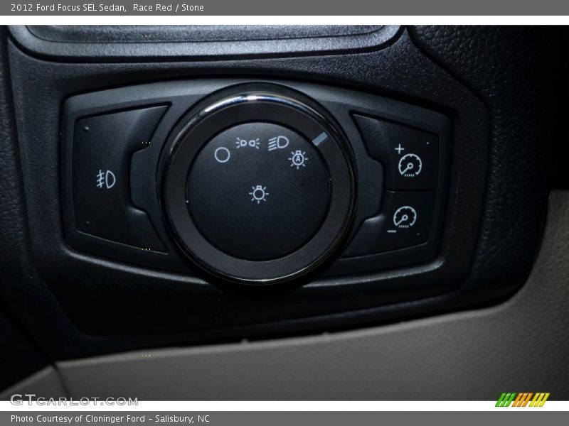 Race Red / Stone 2012 Ford Focus SEL Sedan